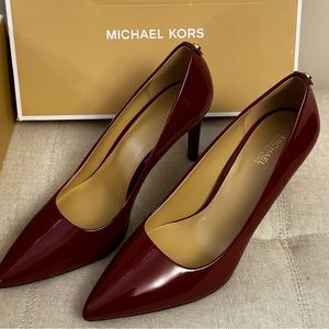 Size 8 wine-colored patent leather heels by Michael Kors